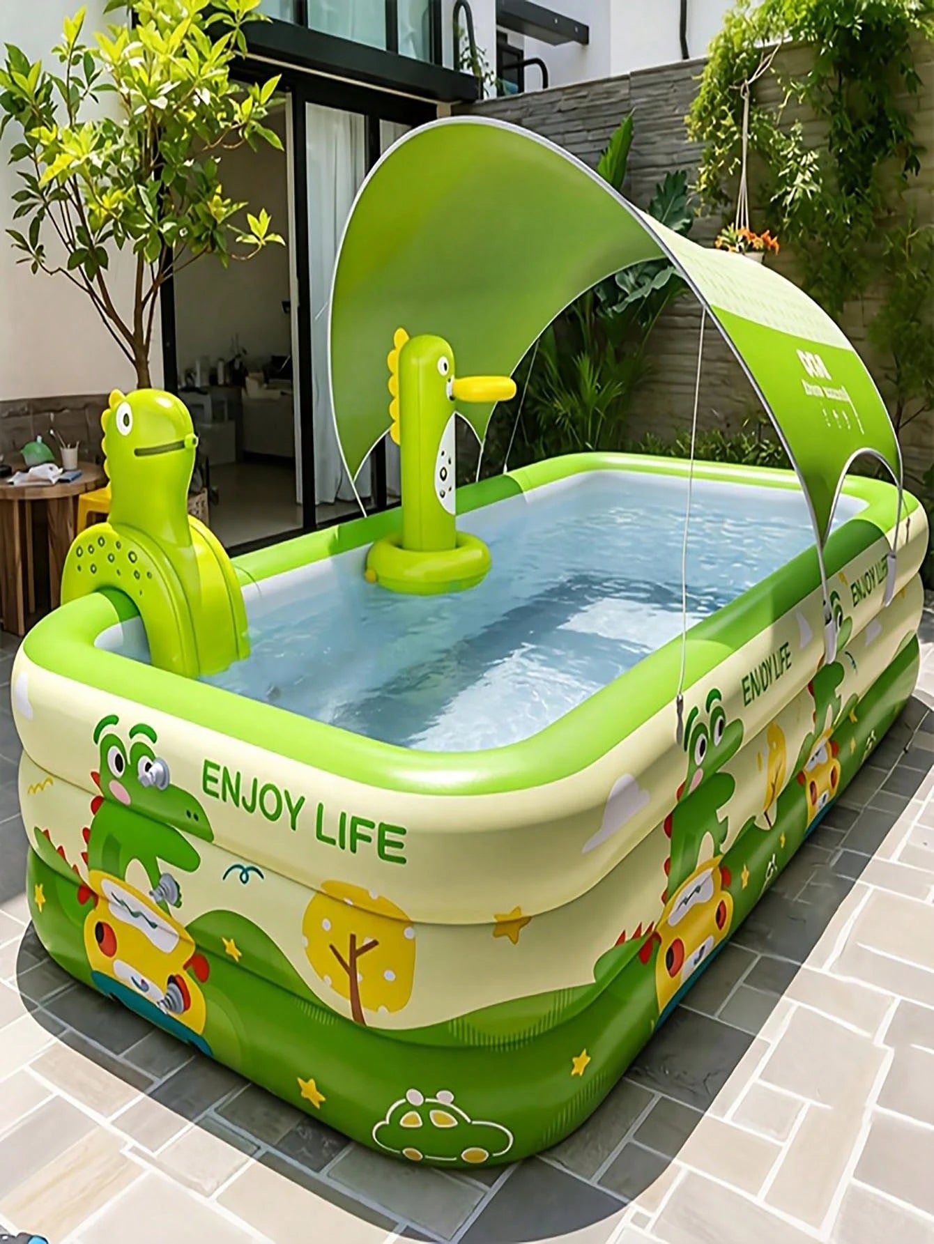 Inflatable slide pool with a sunshade—suitable for backyards, gardens, and summer water parties.